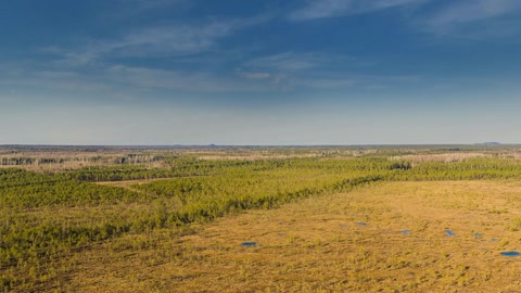 Tundra plain with scattered pools — Stillmotion