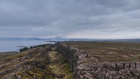 Cloudy tundra with rocky ridges — Stillmotion