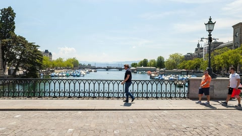 Historic riverside promenade with church towers — Stillmotion