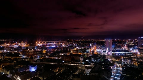 City skyline at night with illuminated streets — Stillmotion