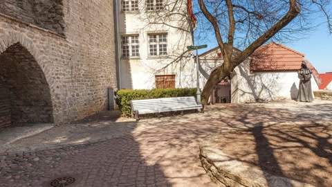 Historic stone courtyard with arches — Stillmotion