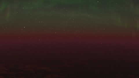 Aurora over dark mountain horizon — Stillmotion