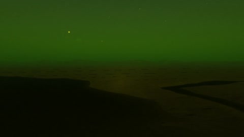 Desert dunes under green sky — Stillmotion
