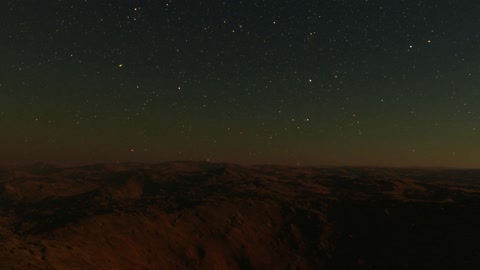 Starry sky over rocky terrain — Stillmotion