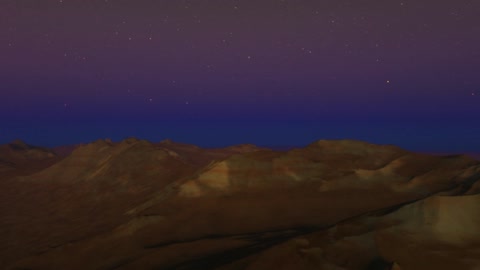 Moonlit badlands under starry sky — Stillmotion