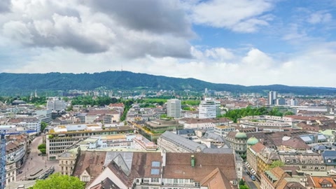 Historic city with river and church spires — Stillmotion