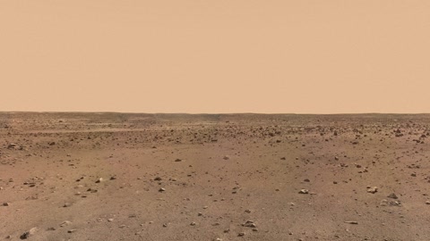 Rocky desert plain under clear sky — Stillmotion