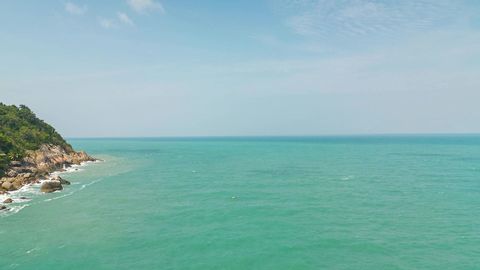 Tropical lagoon with rocky coastline — Stillmotion
