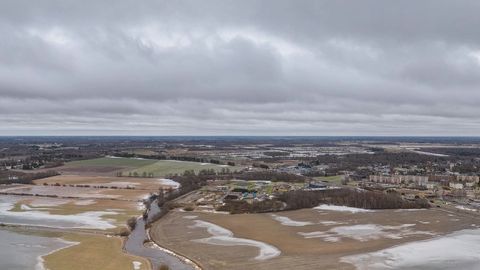 Flooded fields under cloudy sky — Stillmotion