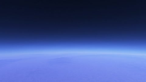 Earth horizon under dark sky — Stillmotion