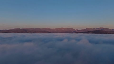 Sunset over foggy cloud layer — Stillmotion