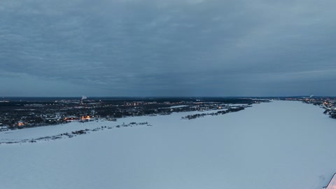Frozen lake and city lights — Stillmotion