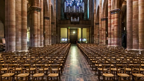 Cathedral interior with rows of chairs — Stillmotion