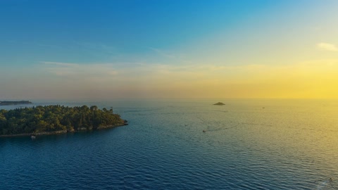 Sunset over a coastal lagoon — Stillmotion