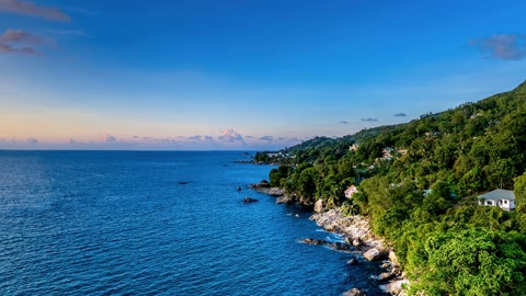 Coastal hillside village and sea — Stillmotion