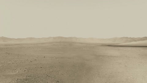 Barren desert plain with distant hills — Stillmotion
