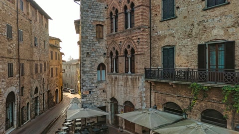 Historic stone buildings in plaza — Stillmotion