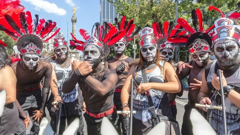Costumed performers in city plaza — Stillmotion