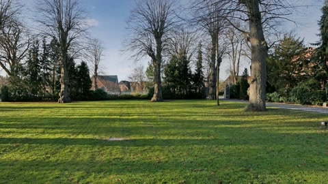Manicured lawn beside historic estate — Stillmotion