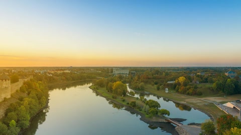 River canal beside historic fortress — Stillmotion