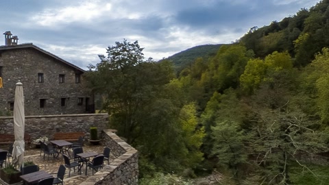 Stone village with mountain views — Stillmotion