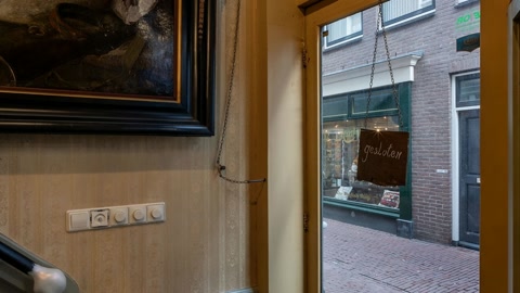 Ornate interior with staircase and street view — Stillmotion