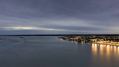 Cable bridge over calm water — Stillmotion