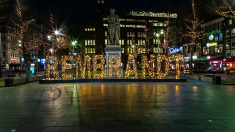 Nighttime plaza with illuminated benches — Stillmotion