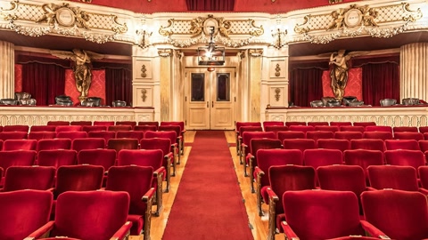 Ornate auditorium with red seats — Stillmotion