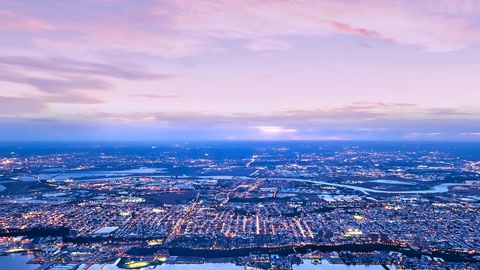 Aerial cityscape at sunset — Stillmotion