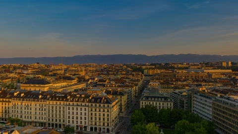 Sunset over coastal city and harbor — Stillmotion